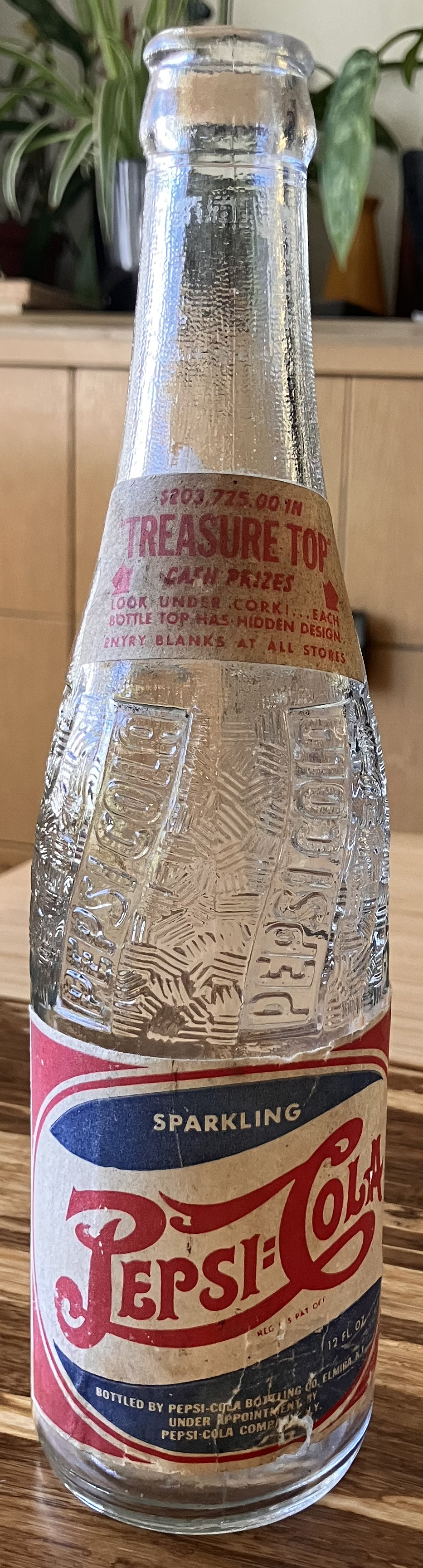 Treasure Top glass bottle from top to bottom