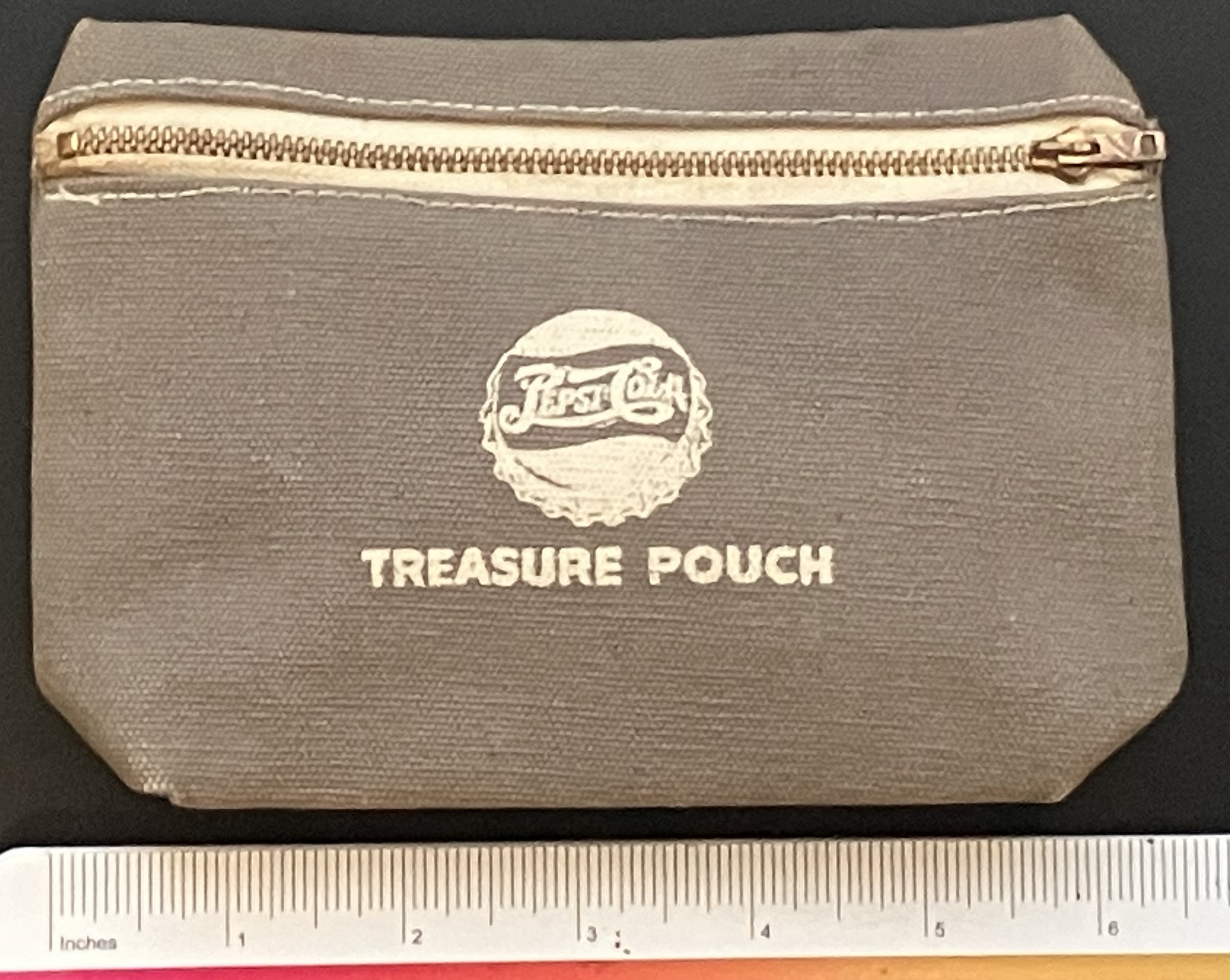 Front view of Treasure Pouch with ruler for scale