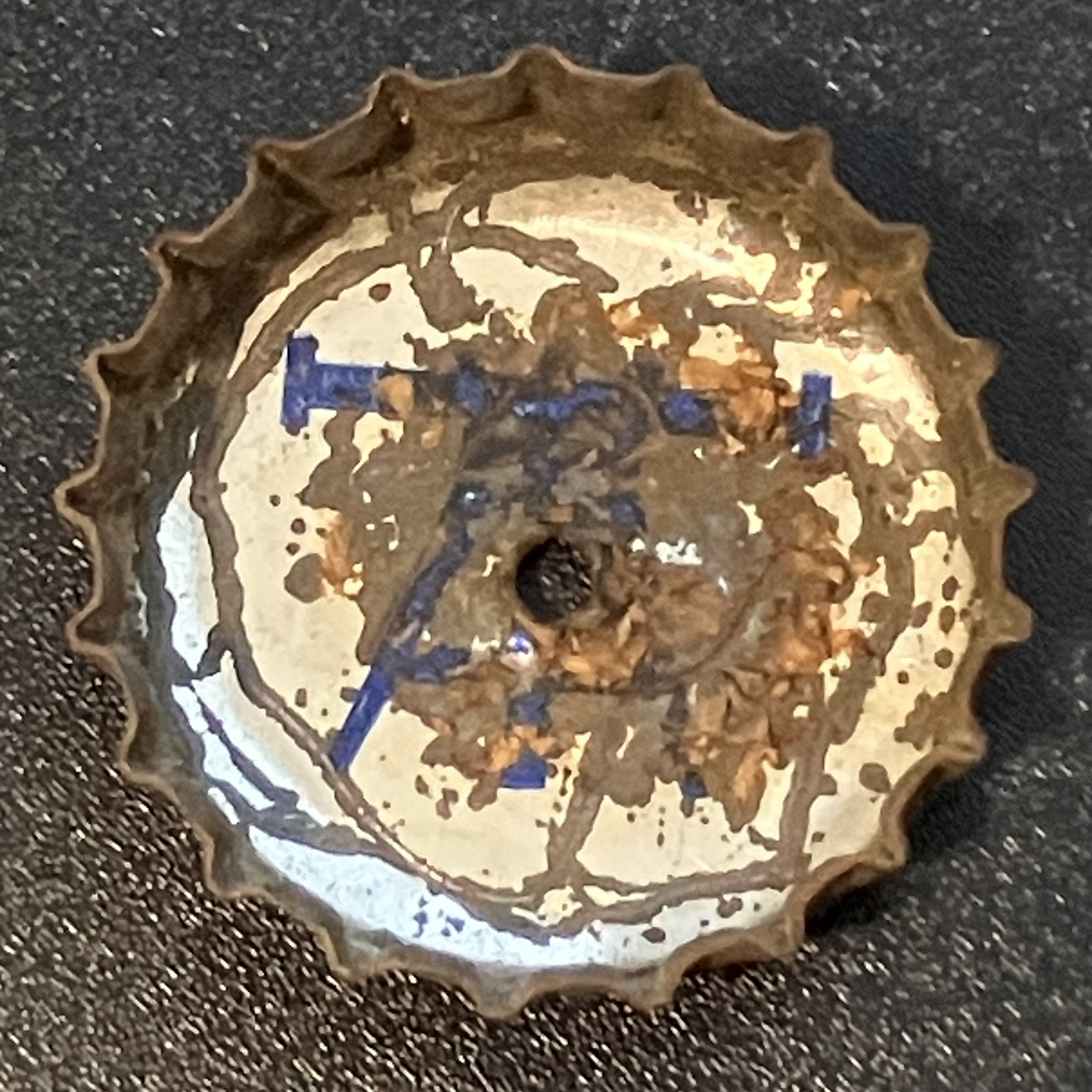 crown-cap liner of unadvertised variant