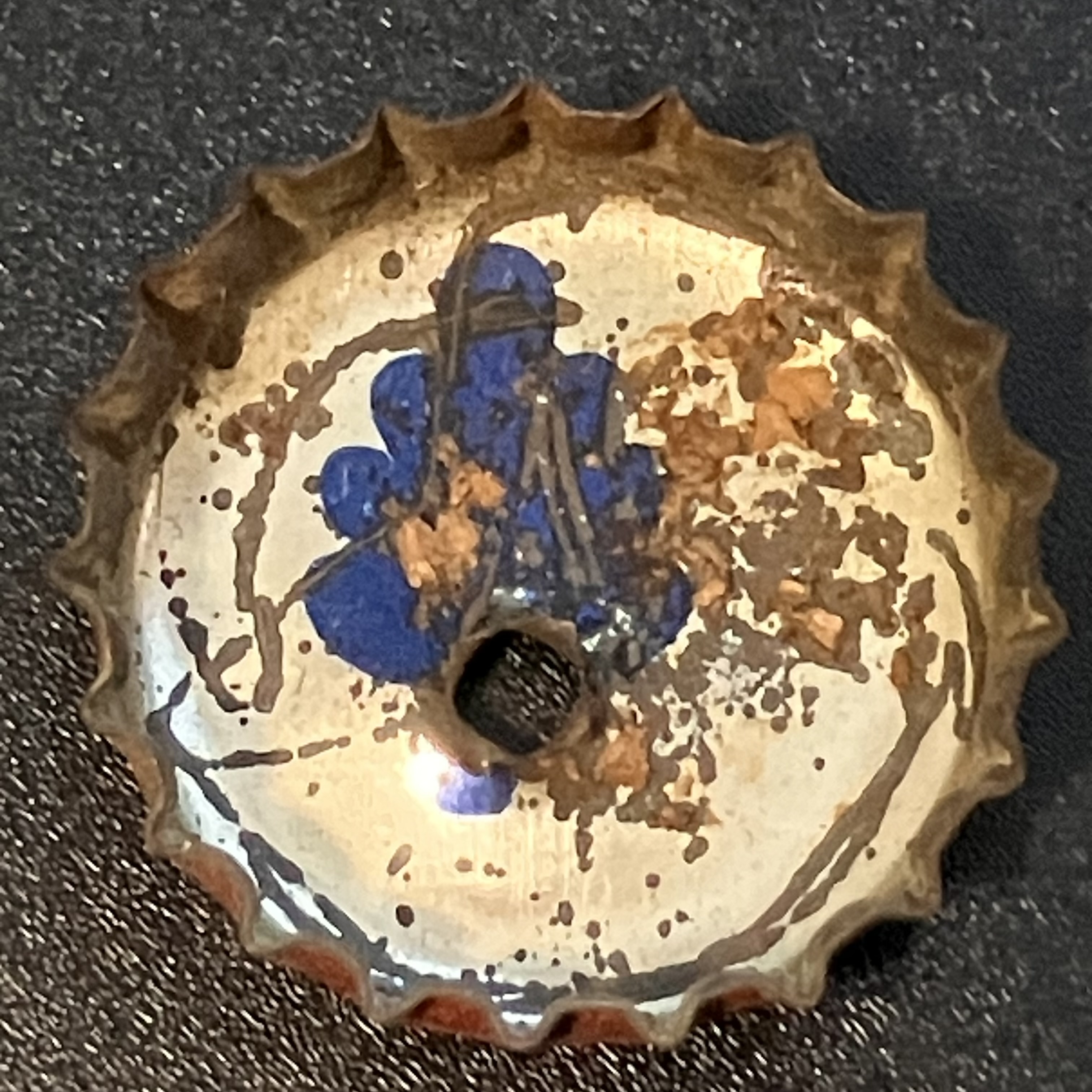 crown-cap liner of unadvertised variant