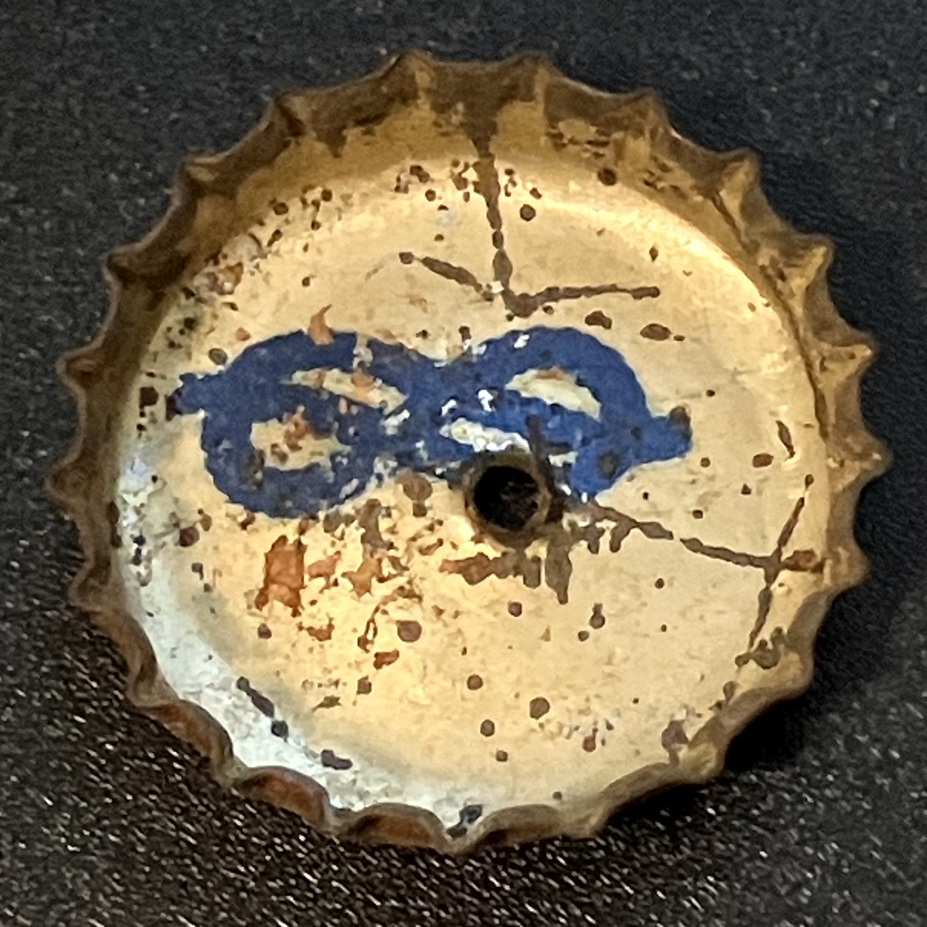 crown-cap liner of unadvertised variant