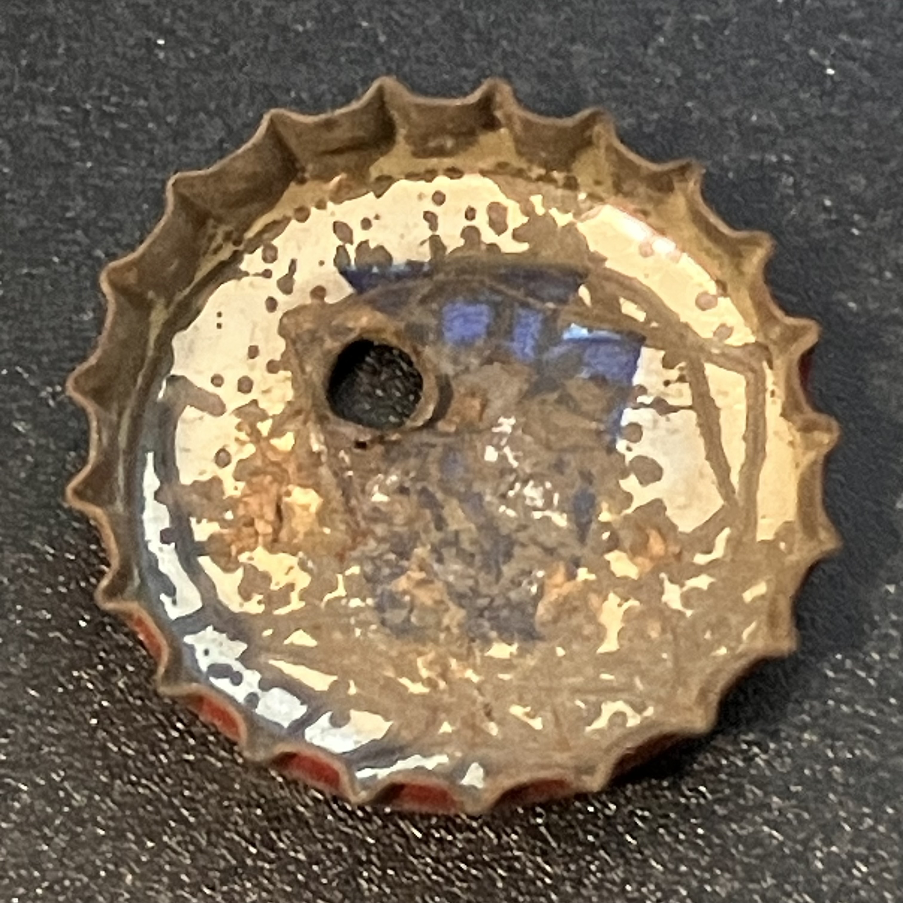 crown-cap liner of unadvertised variant