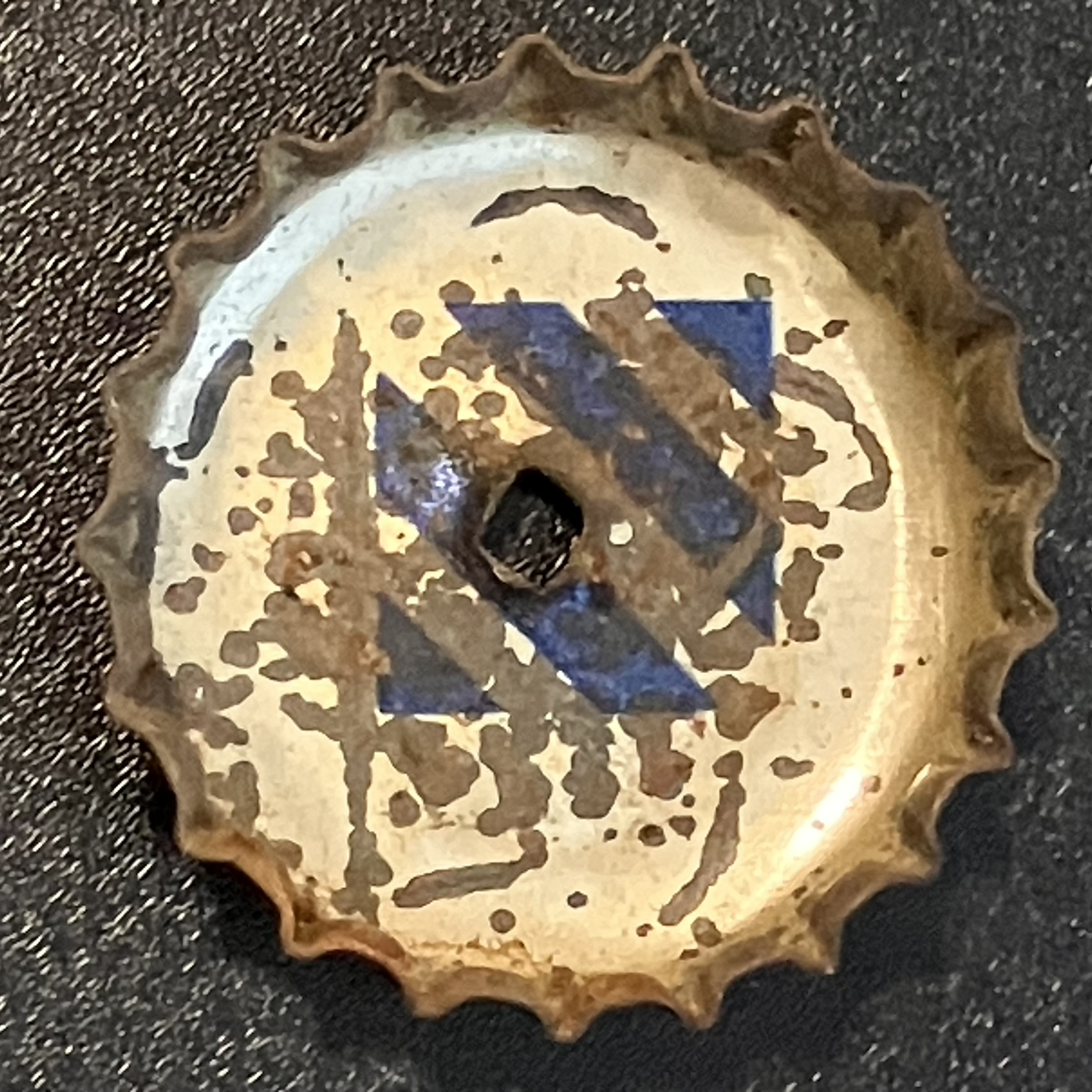 crown-cap liner of unadvertised variant