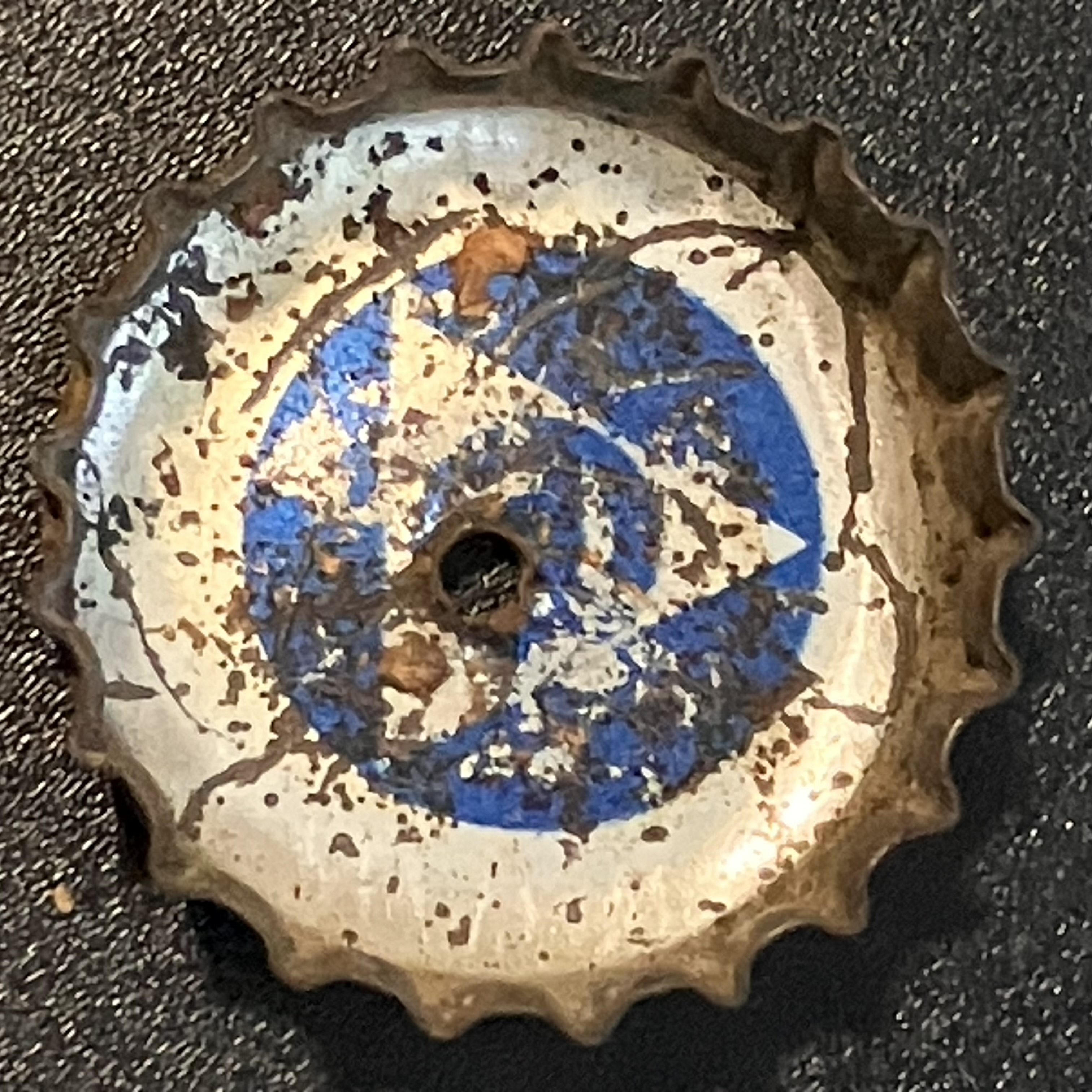 crown-cap liner of unadvertised variant