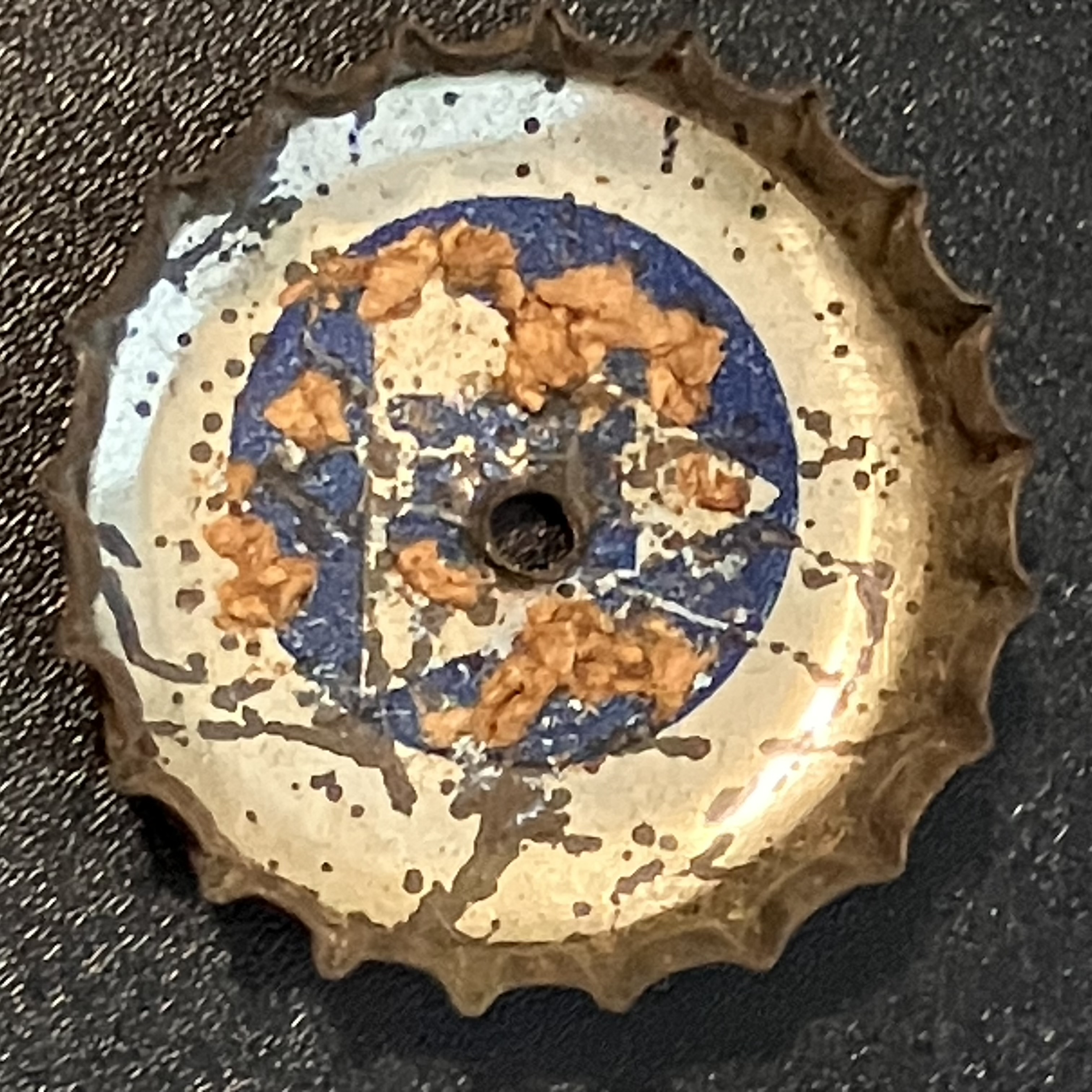 crown-cap liner of unadvertised variant